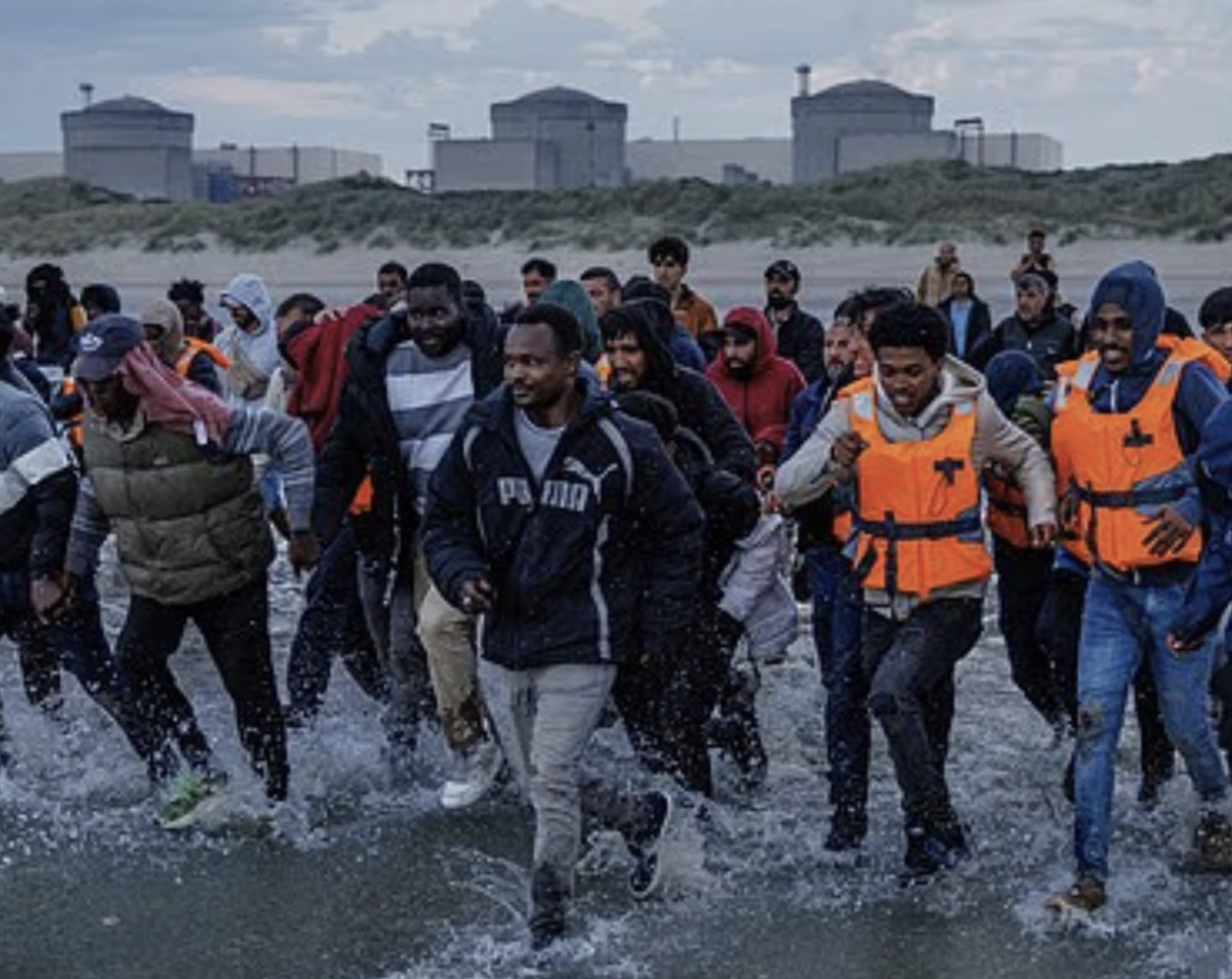 mn migrants sprinting